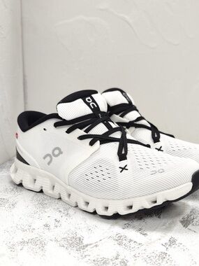 On Running White and Black Cloudflow Sneakers